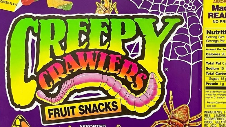 Close-up of a purple box of Creepy Crawlers fruit snacks
