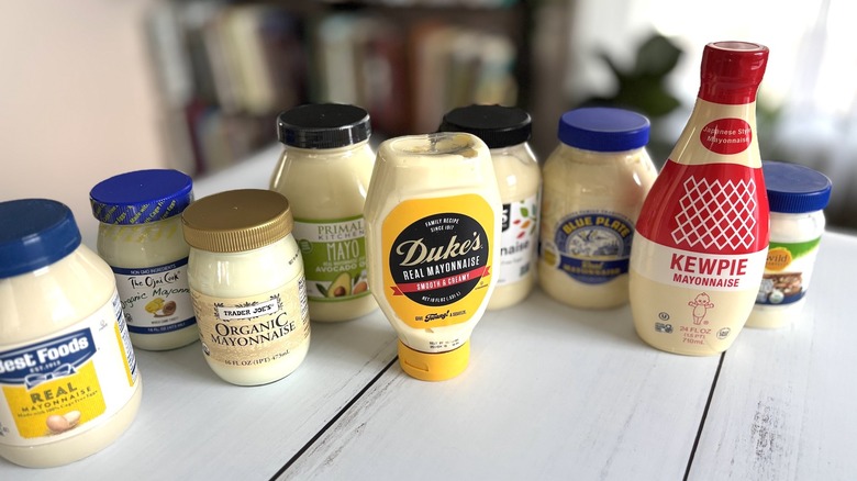Lineup of various mayonnaises on table