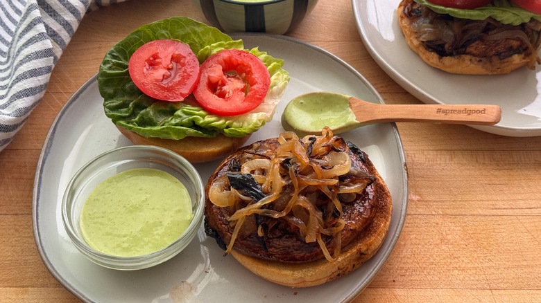 open face portobello burger with green sauce