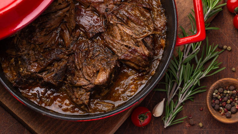 Pot roast in Dutch oven with seasonings