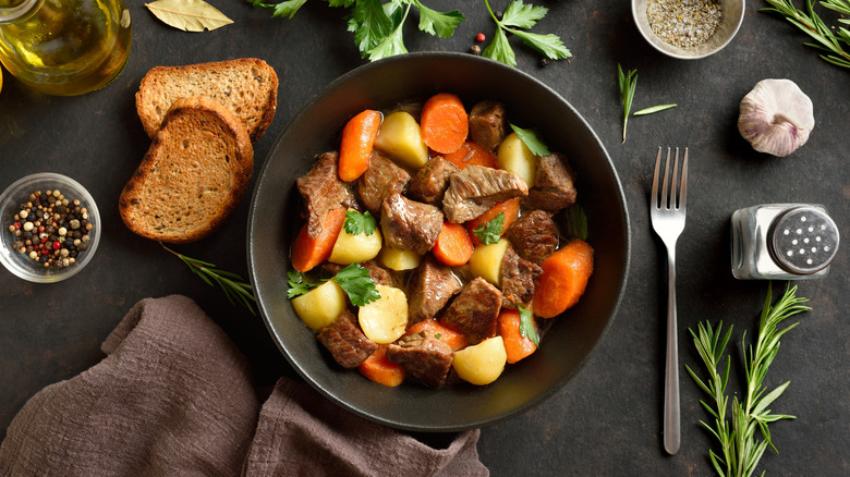 Pot roast in a bowl with potatoes and carrots