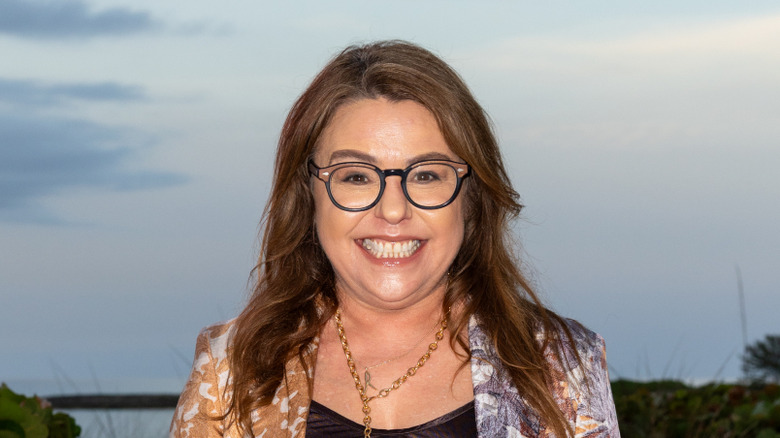 Rachael Ray wearing glasses and smiling