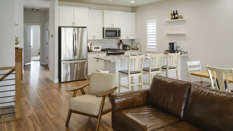 An open plan kitchen, living, and dining room