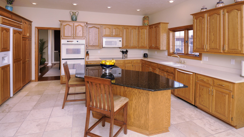 A kitchen with shellac-finished wooden cabinets