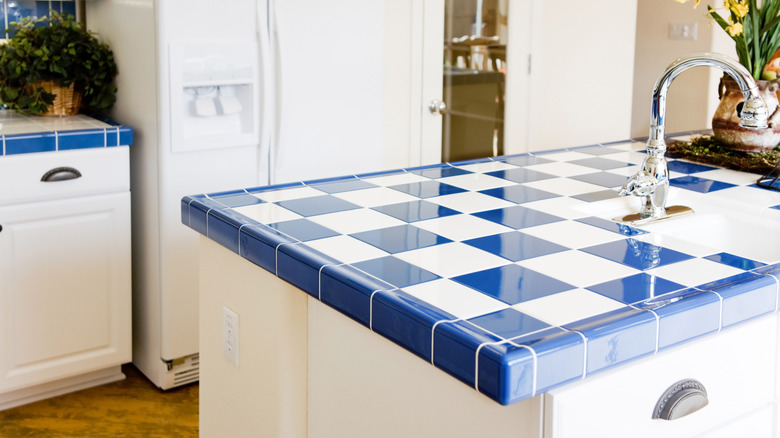 Blue and white tiled kitchen countertop