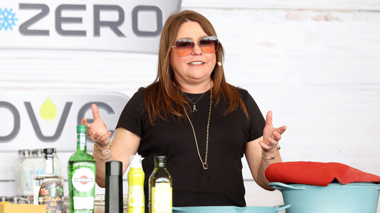 rachael ray with hands outstretched 