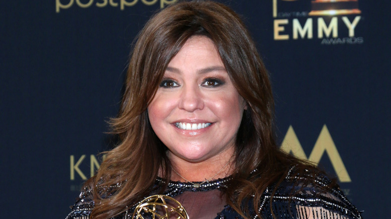 Rachael Ray against a black backdrop