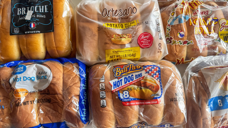 Hot dog buns on white surface