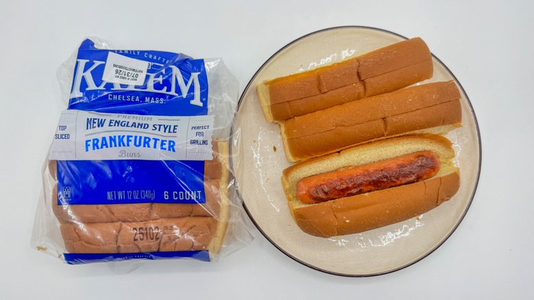 Hot dog with buns on a plate with packaging