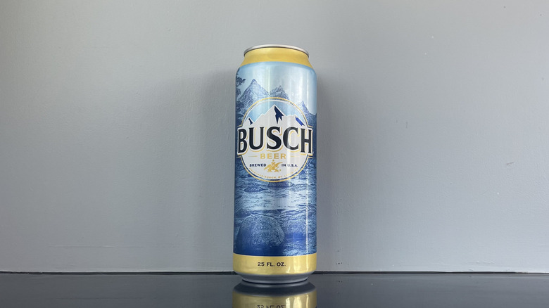 A tall boy of Busch on dark table