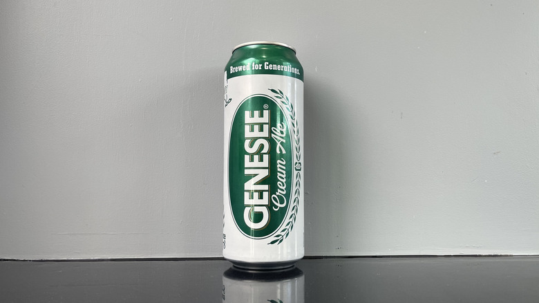 A tall boy of Genesee on dark table