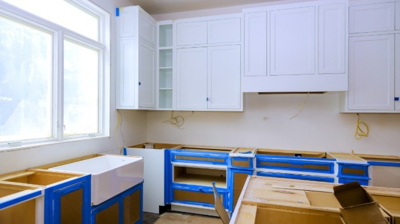 A kitchen with countertops under active construction.