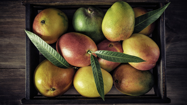 Wooden crate of mangos