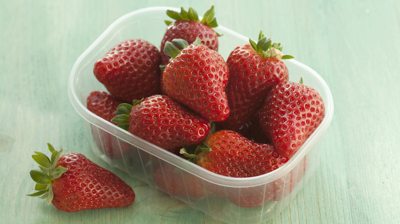 Container of fresh strawberries