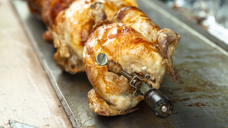 rotisserie chicken on spit