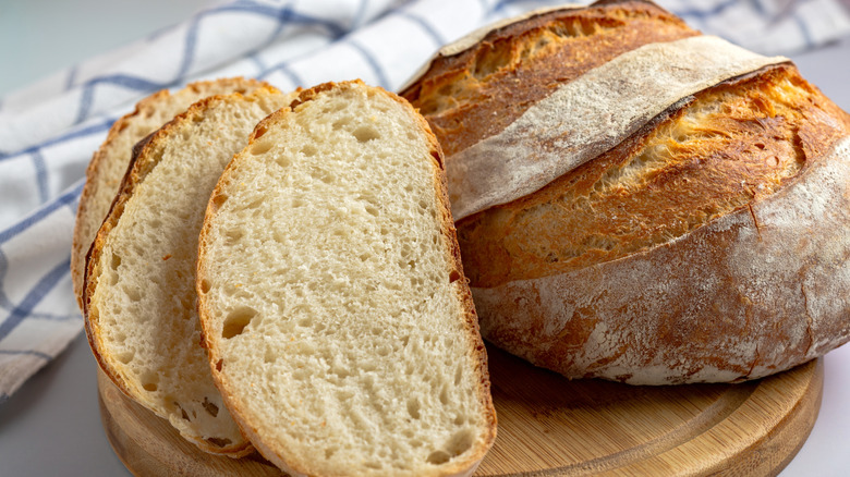 A sliced sourdough bread boule
