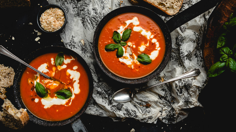 Two bowls of tomato soup