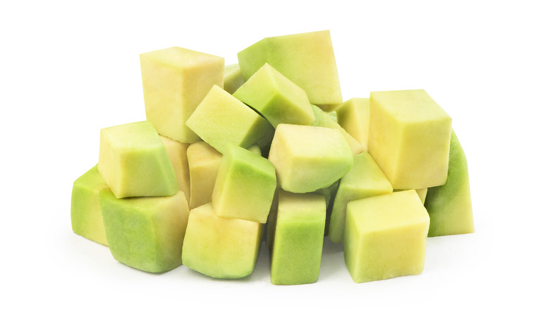 Diced avocado on a white background