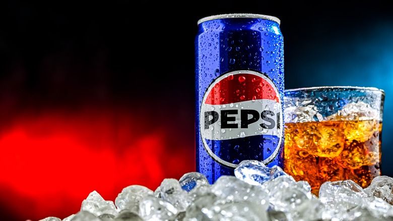 Pepsi can and cup in ice