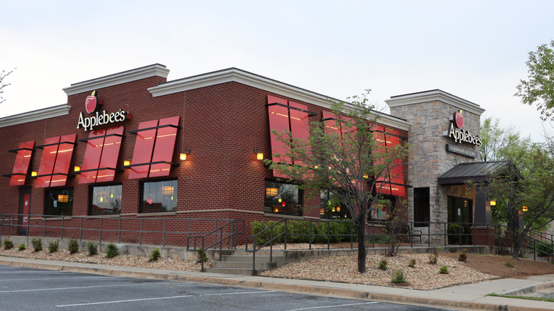 Applebee's restaurant front with stairs from parking lot