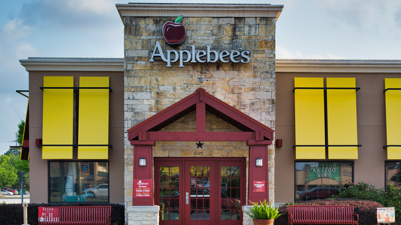 The exterior of an Applebee's restaurant with the entrance doors