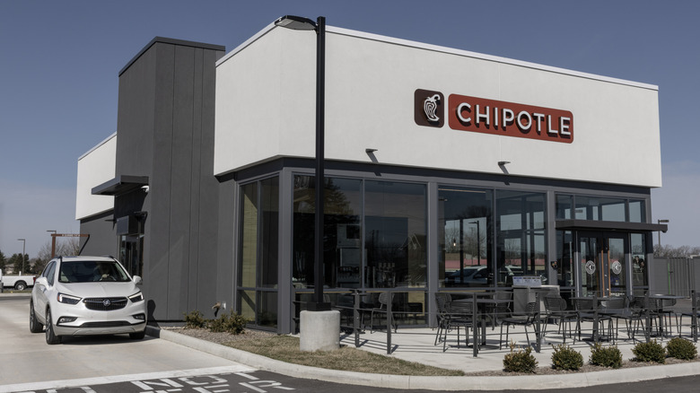 Chipotle storefront with a drive-thru lane
