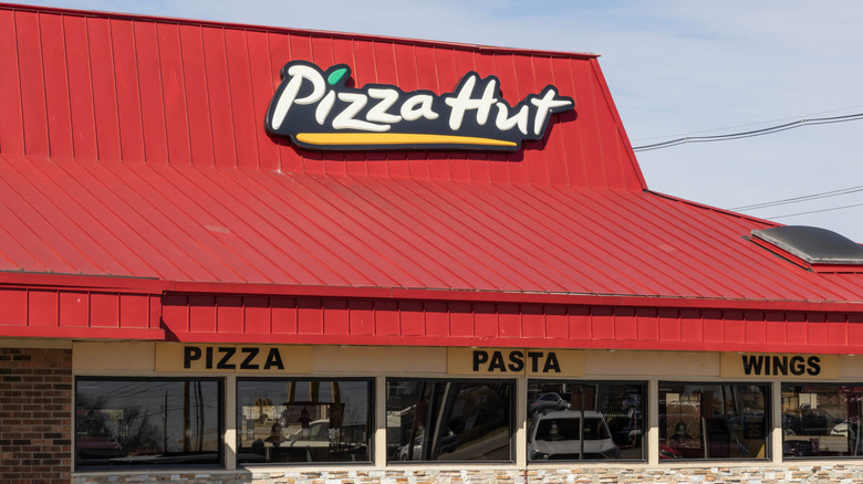 Classic Pizza Hut location with a red rook