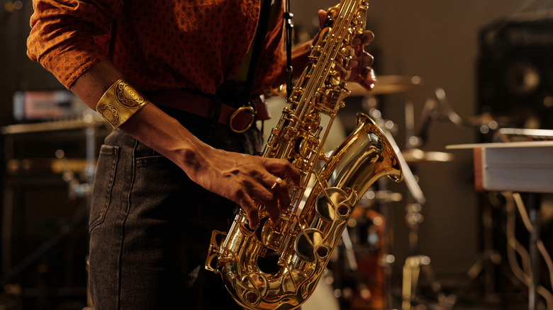 Closeup of person playing saxophone