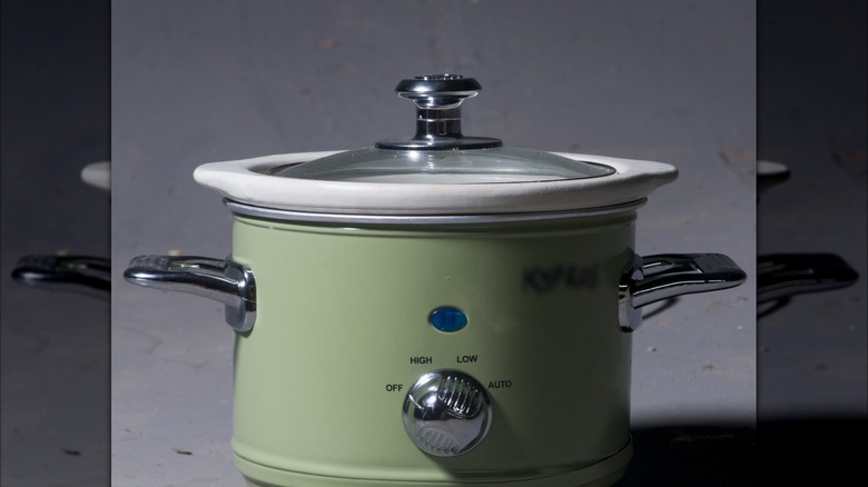 A vintage green crockpot