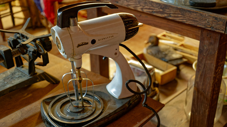 A vintage Sunbeam Mixmaster in an antique shop