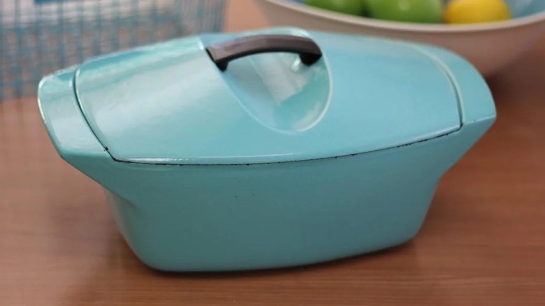 A blue Le Creuset La Coquelle Dutch oven