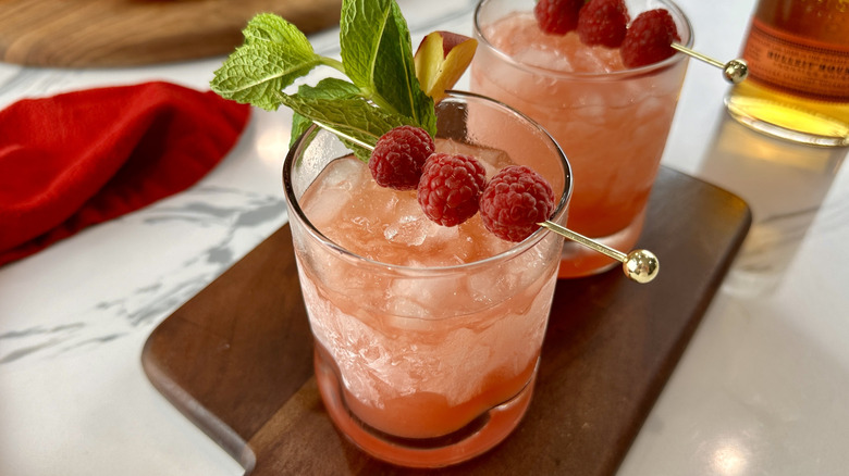 Peach and raspberry bourbon smash