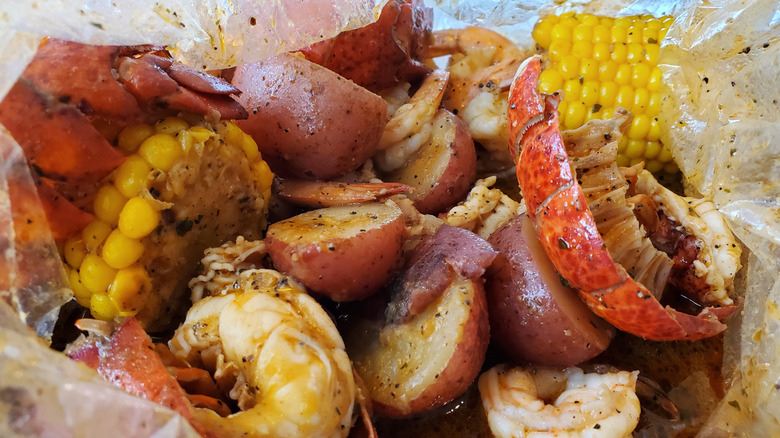 Red Lobster's Lobsterfest Boil with split Maine lobster tails, shrimp, corn on the cob, and red potatoes.