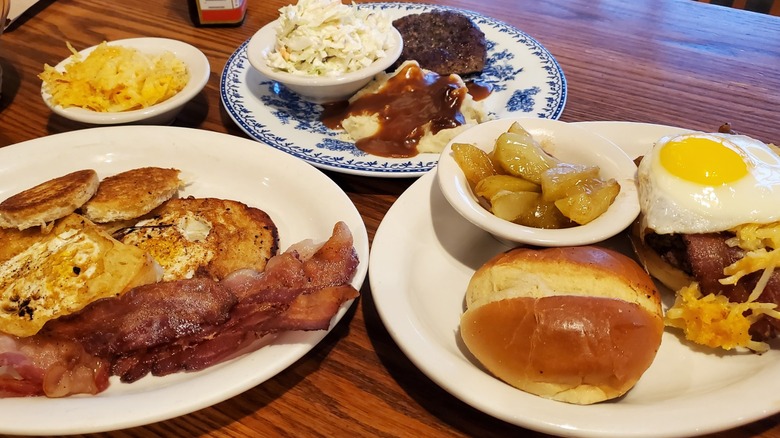 Hamburger steak, eggs in the basket, and breakfast burger from Cracker Barrel