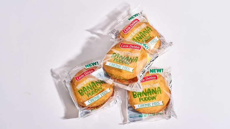 banana creme pies wrapped in plastic on a table