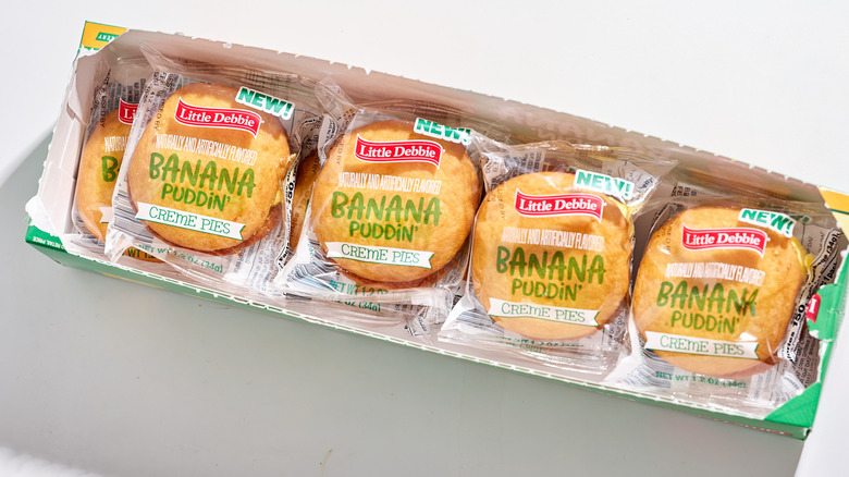 8 packages of creme pies inside a box