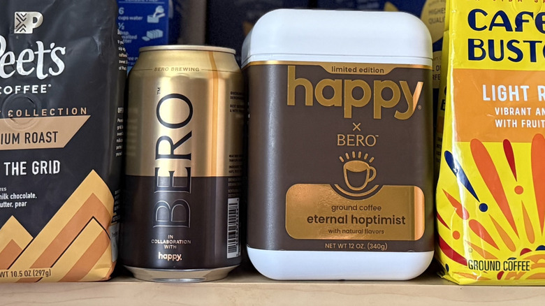 A cabinet filled with various coffee bags