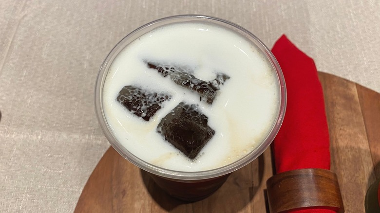 White foamy iced coffee drink