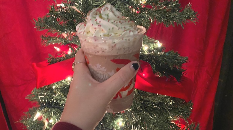 Hand holding frozen drink