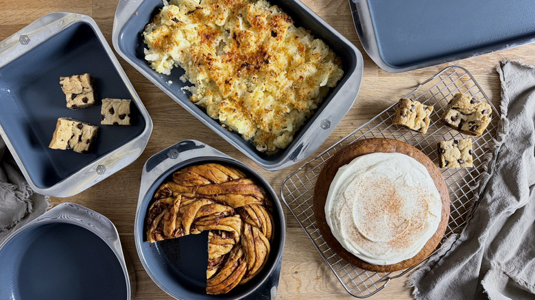 Multiple baked goods on various pans and cooling racks