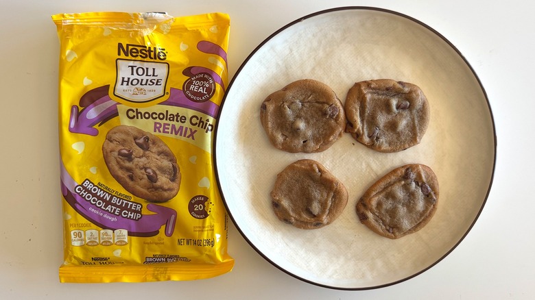 Chocolate chip cookies on a plate with packaging