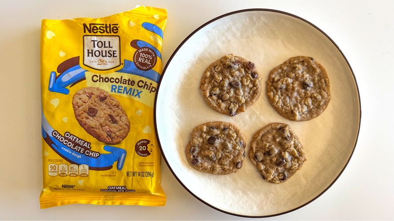 Chocolate chip cookies on a plate with packaging