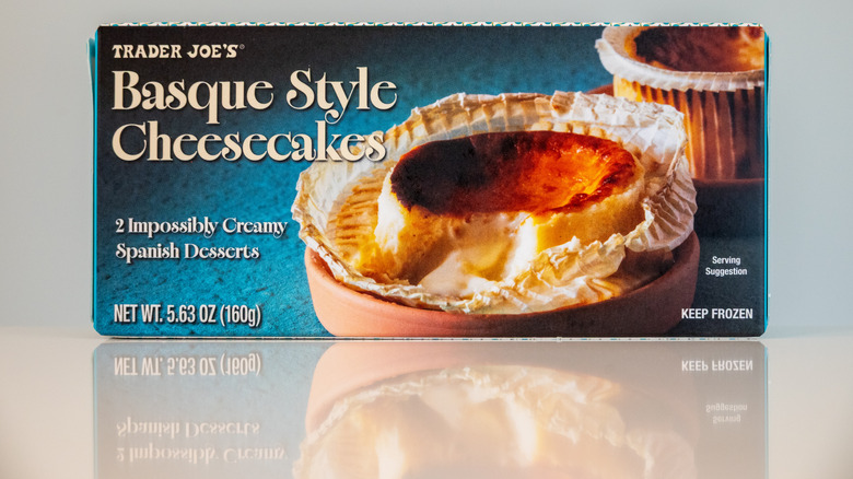 A box of Trader Joe's Basque-style Cheesecakes on a white counter with a gray background