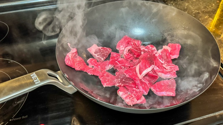 Yeti carbon steel wok with steak