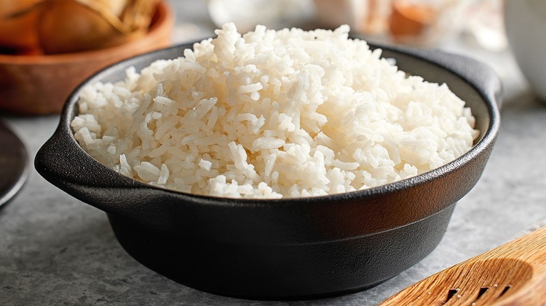A pot of cooked white rice.