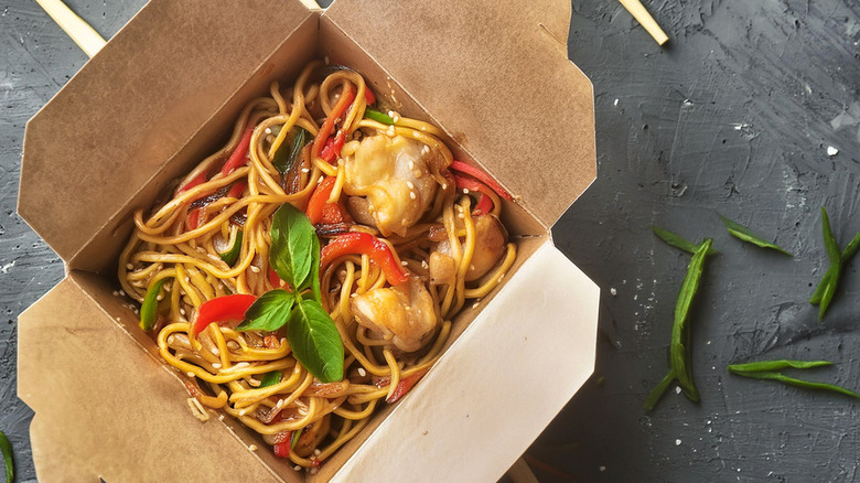 Chinese chicken noodles in a paper box