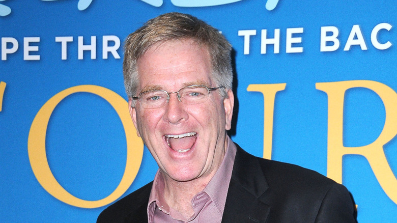 Rick Steves smiling with his mouth open