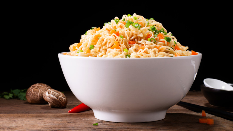 Bowl of noodles with scallions