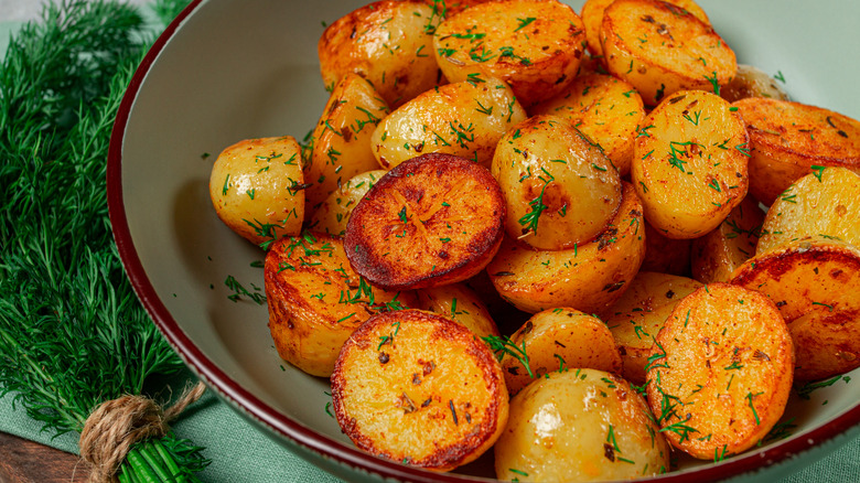 Crunchy oven-roasted potatoes with fresh dill.
