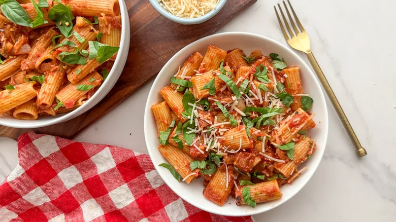 Spicy rigatoni pasta on plate.